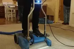 close-up of carpet machine removing excess water from the carpets