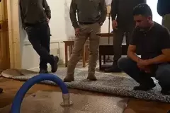 property restoration students removing water from subfloor